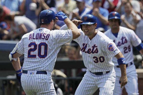 Surging Mets win 7-2, sweep Marlins behind 4 homers