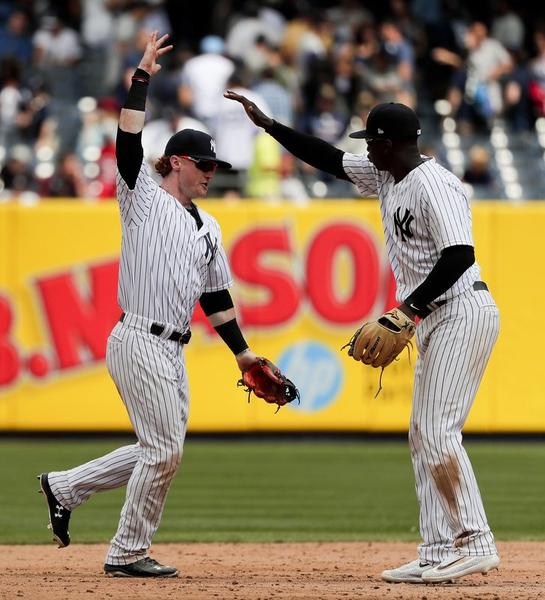 Severino, homers lead Yankees past Reds 9-5